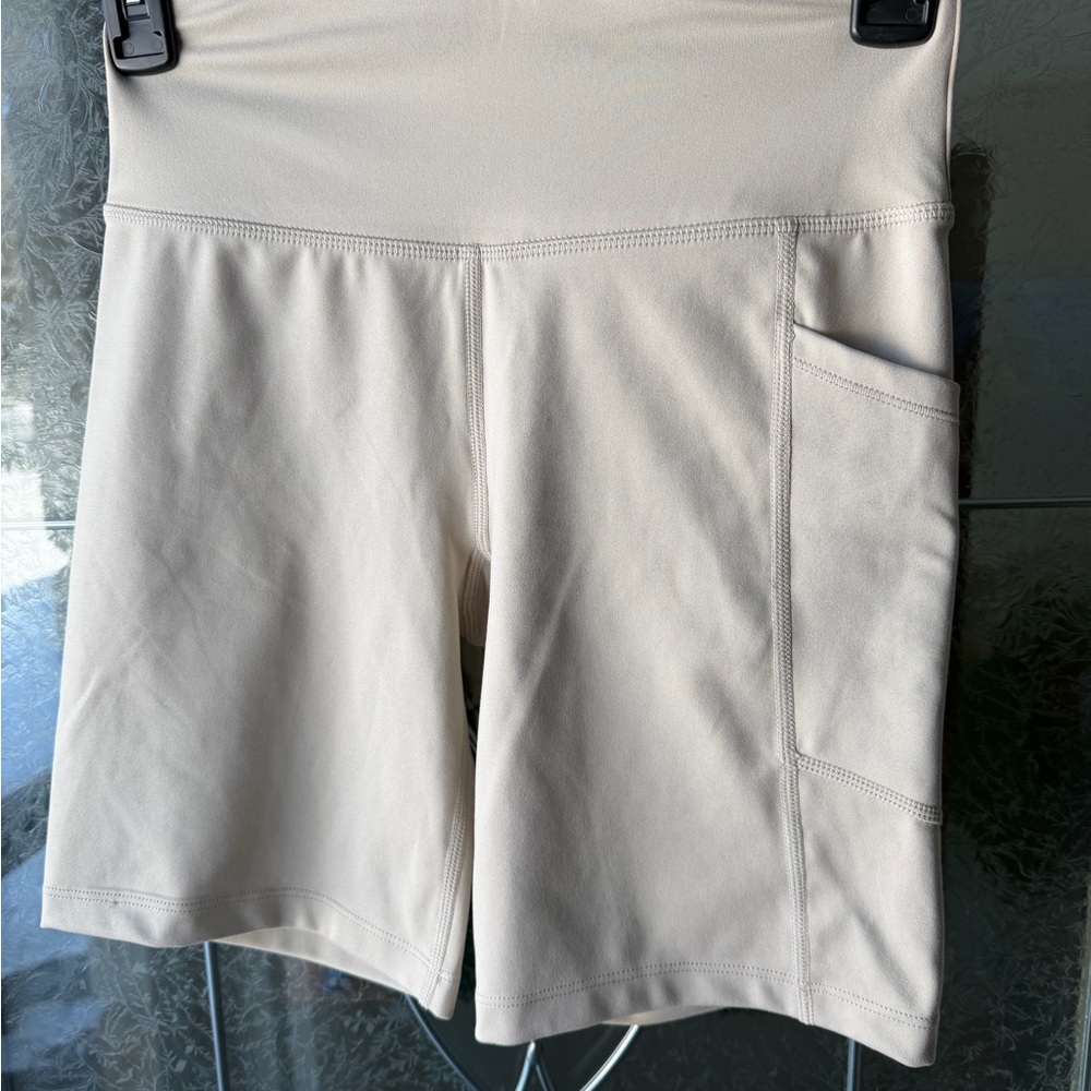 LAST CALL 
DKNY Women's Cream Bike Shorts